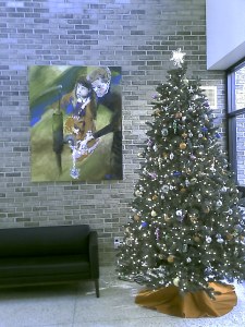 HKNC's Christmas tree in the Lobby along with the painting by a DeafBlind student of "Helen's Well.